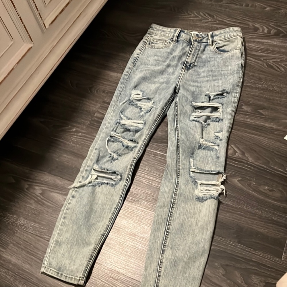 Ripped light wash denim